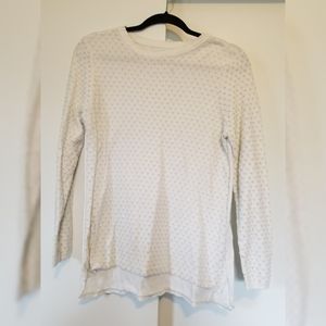 White and gold sweater